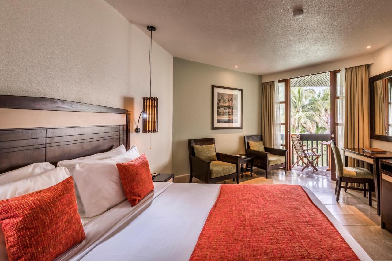 Отель The Warwick Fiji Королеву Экстерьер фото A room at the hotel